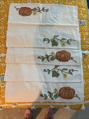 Pottery Barn White Cotton placemats with Orange Pumpkins dry-cleaned